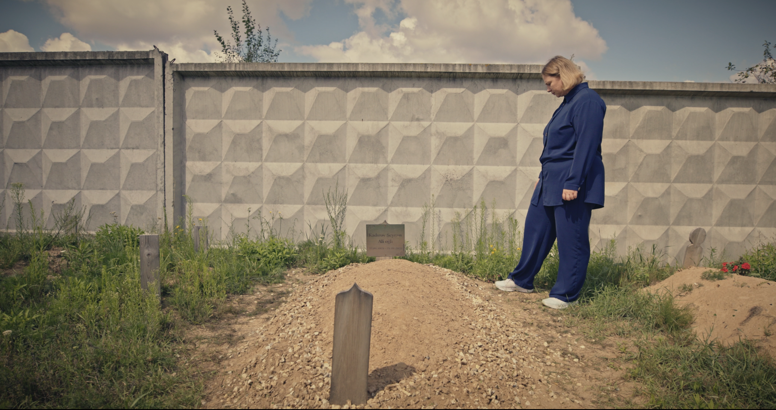 Elena Kadyrova visits the grave of her husband, soldier Seyran Kadyrov, reflecting on the sacrifice he made for his family and country. He was killed at the front in 2023.